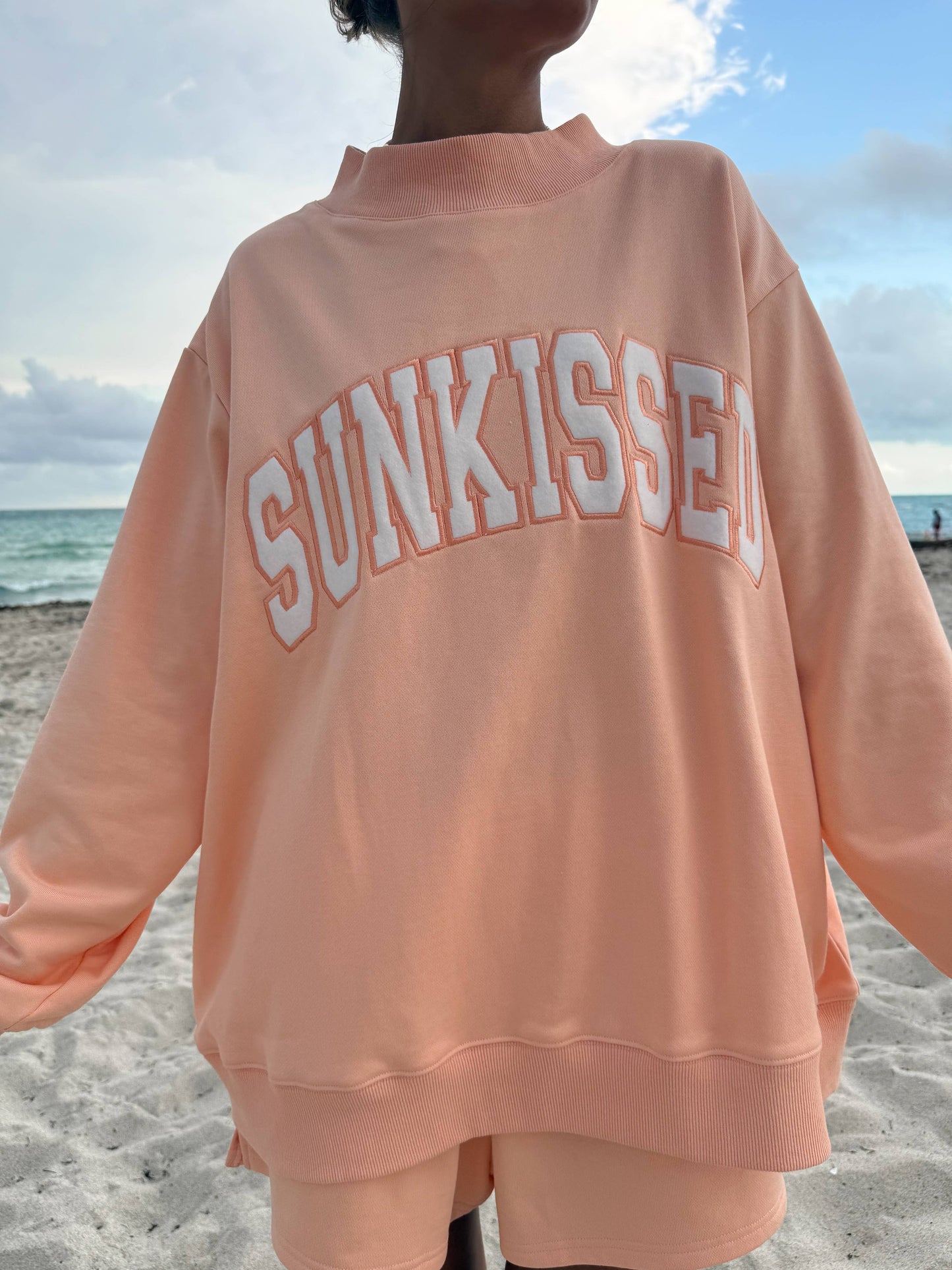 Varsity Sunkissed Embroidered Mockneck: Papaya Orange