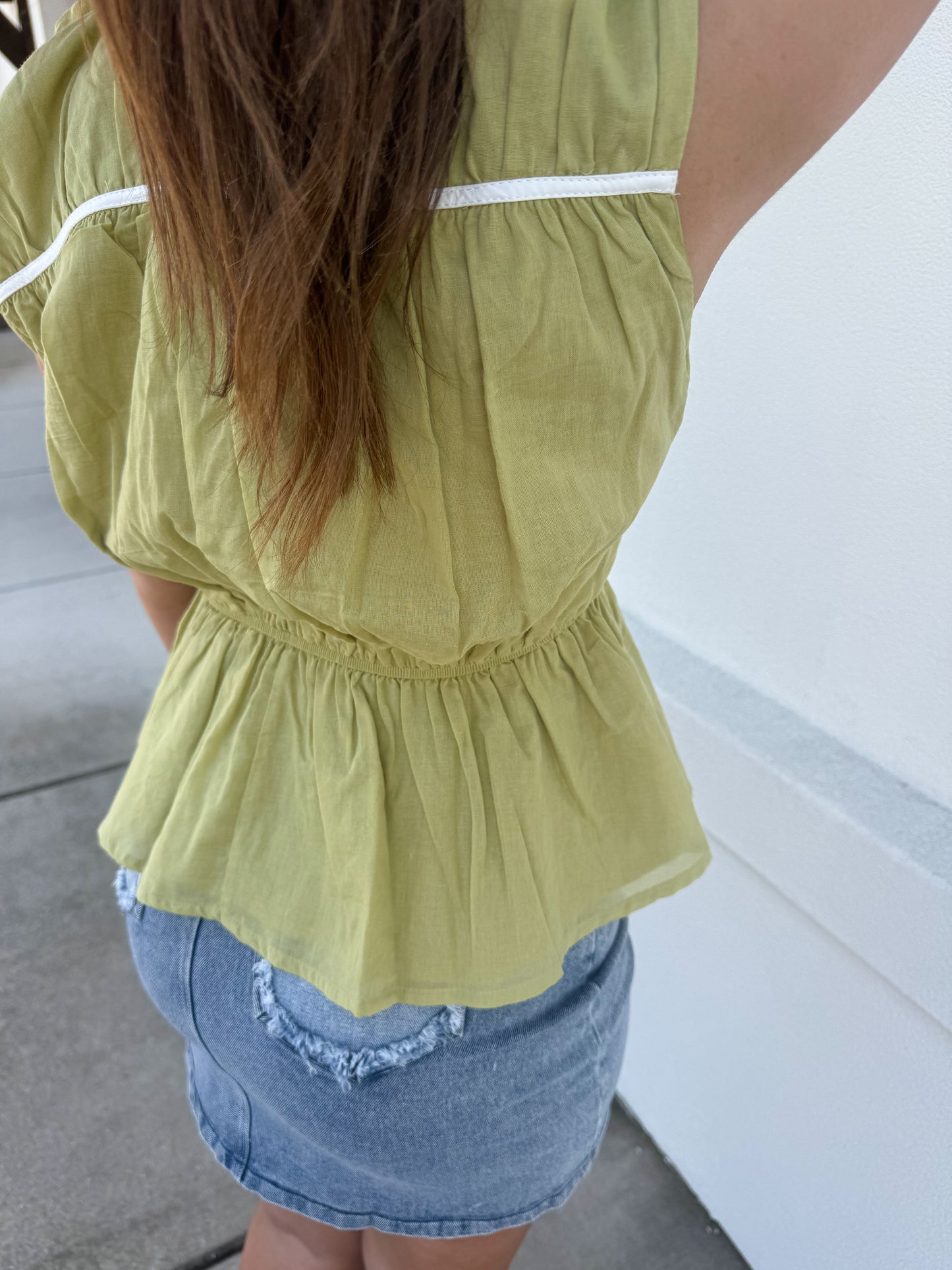 Sleeveless Top with Bow Detail