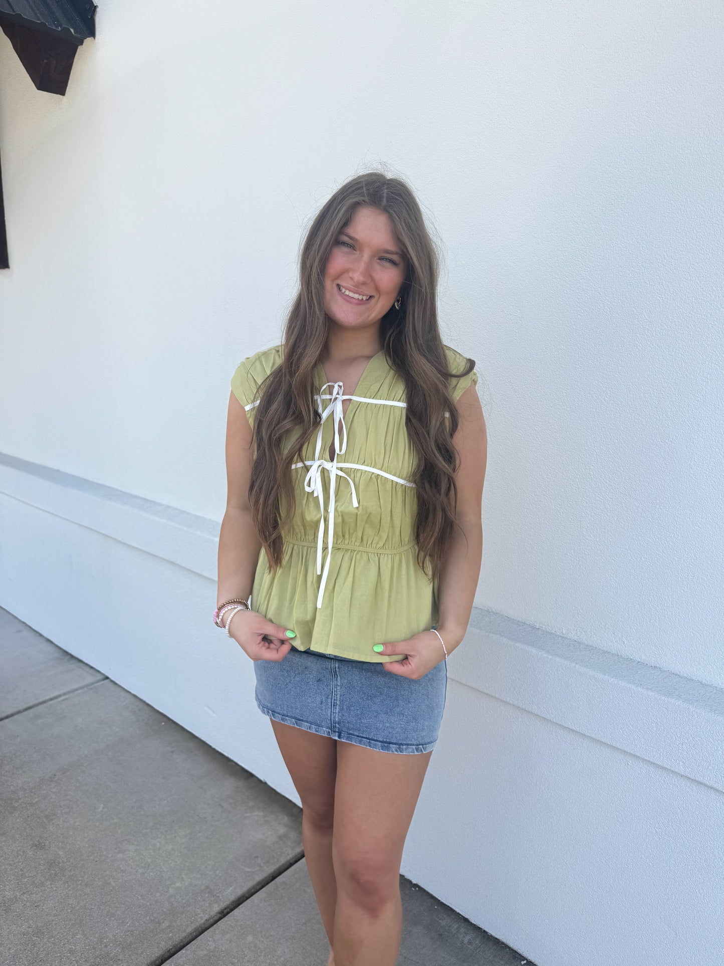 Sleeveless Top with Bow Detail