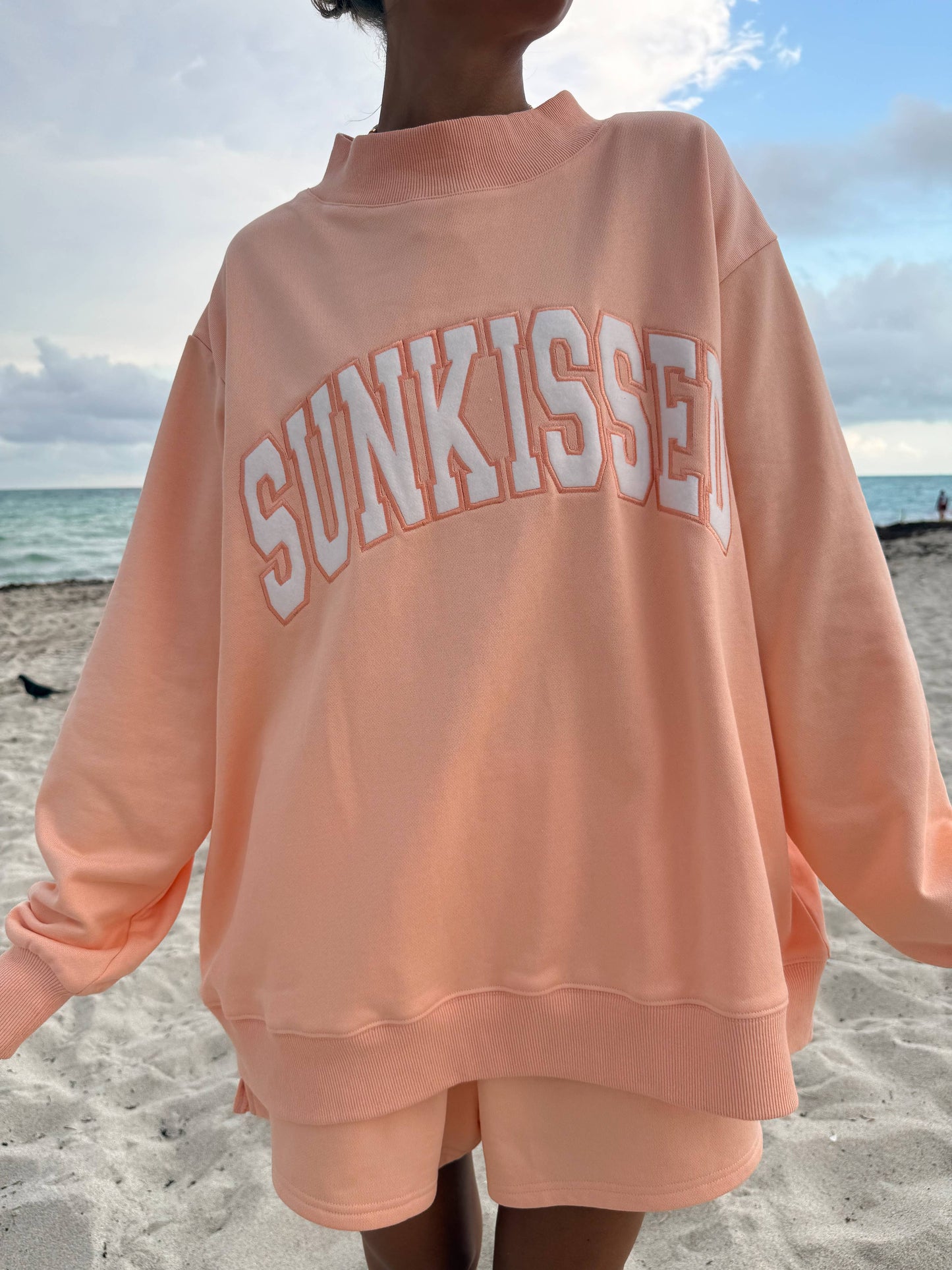 Varsity Sunkissed Embroidered Mockneck: Papaya Orange
