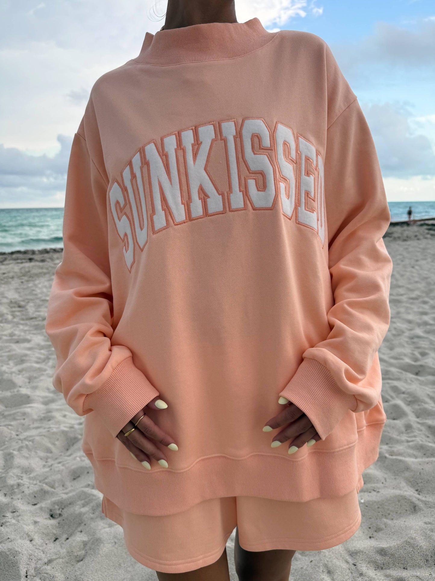 Varsity Sunkissed Embroidered Mockneck: Papaya Orange