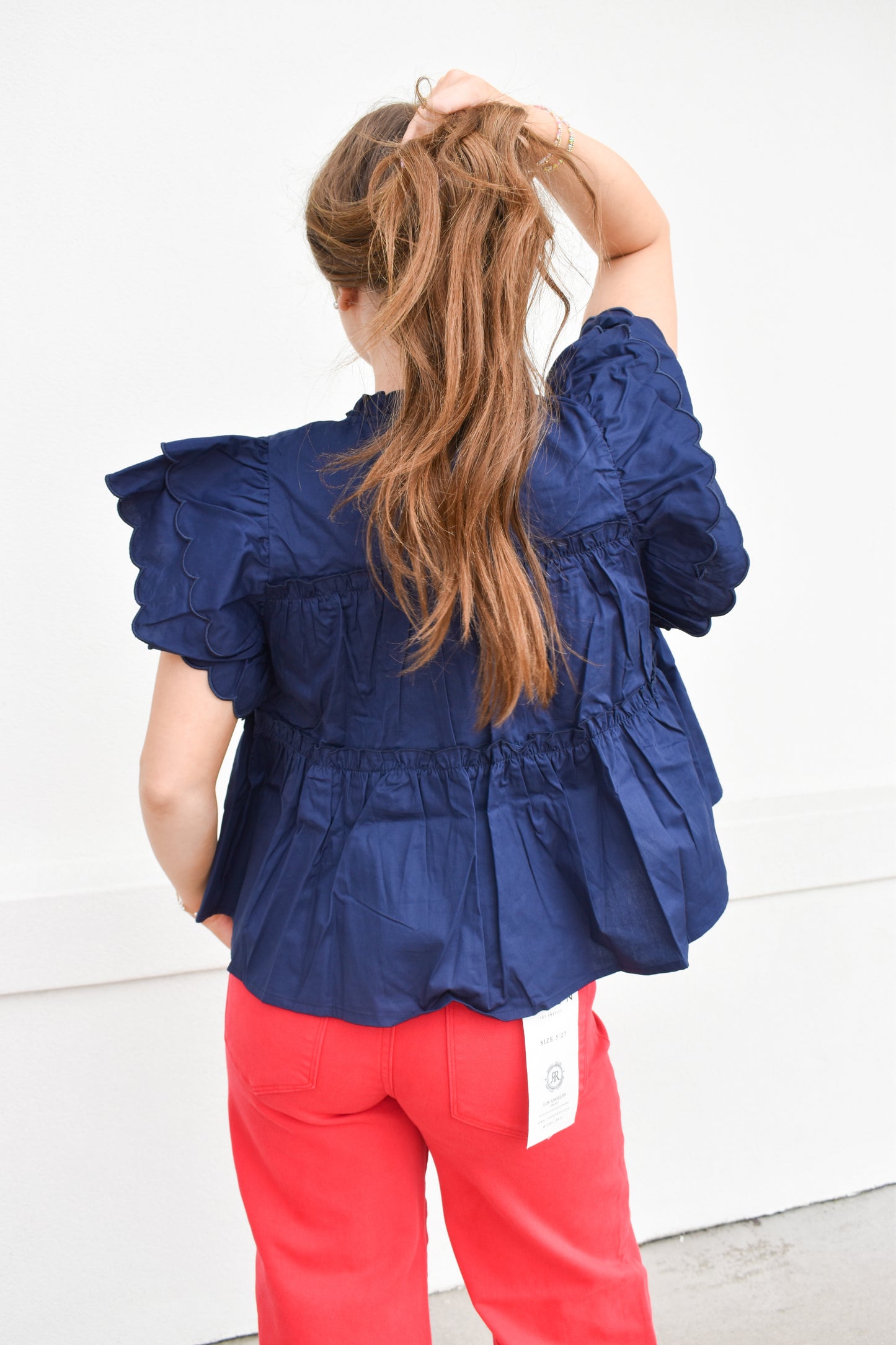 The Navy Scallop Ruffle Top