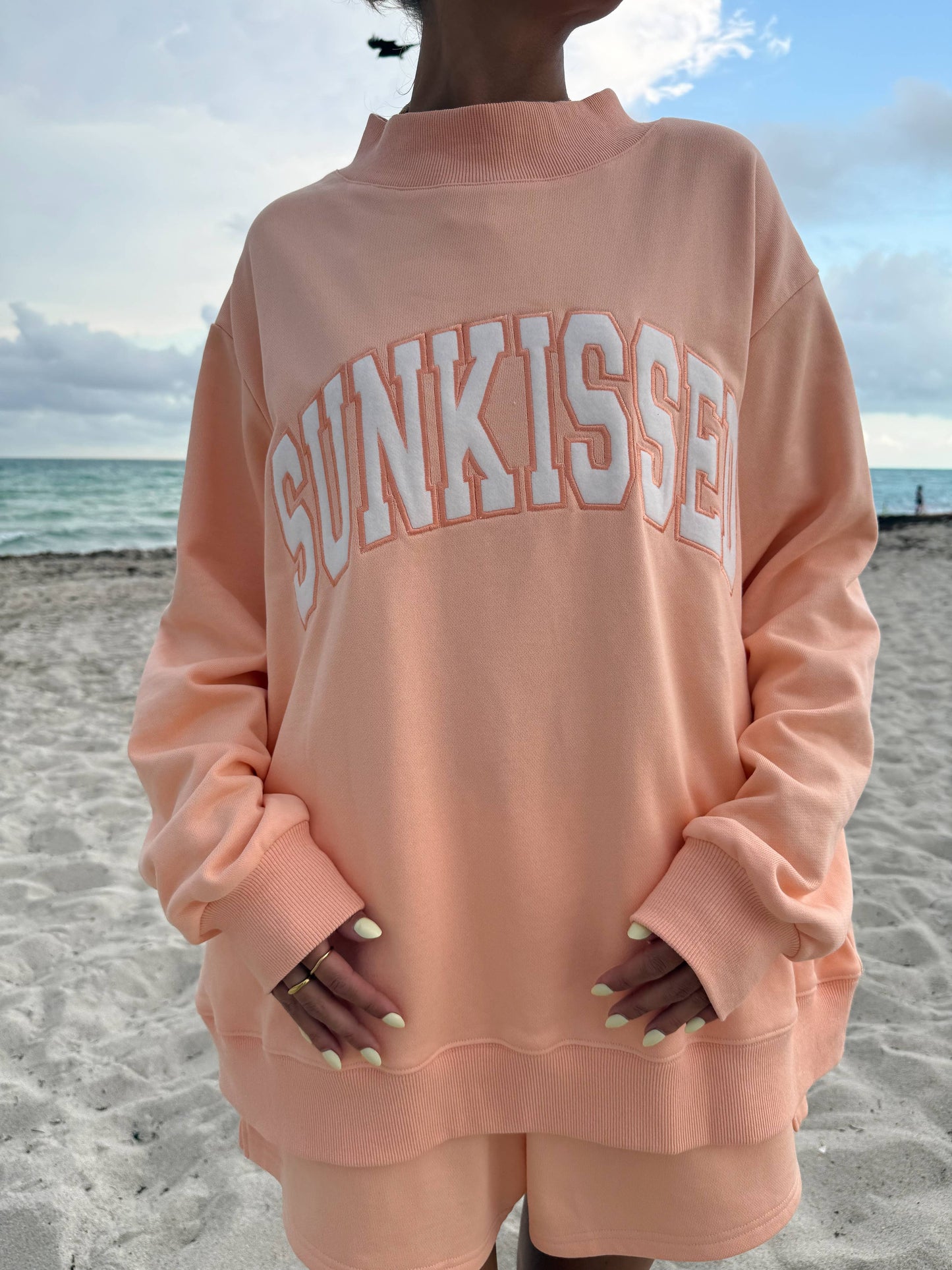 Varsity Sunkissed Embroidered Mockneck: Papaya Orange