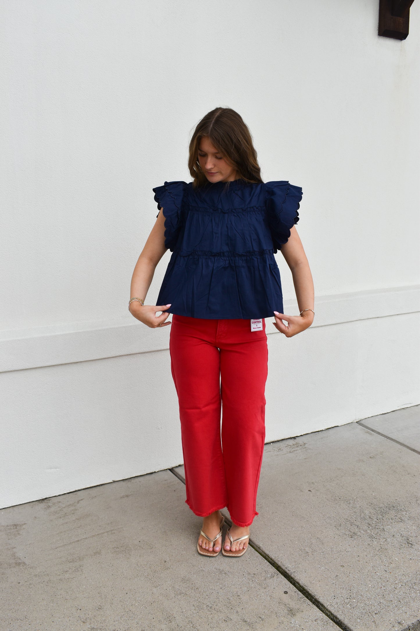 The Navy Scallop Ruffle Top