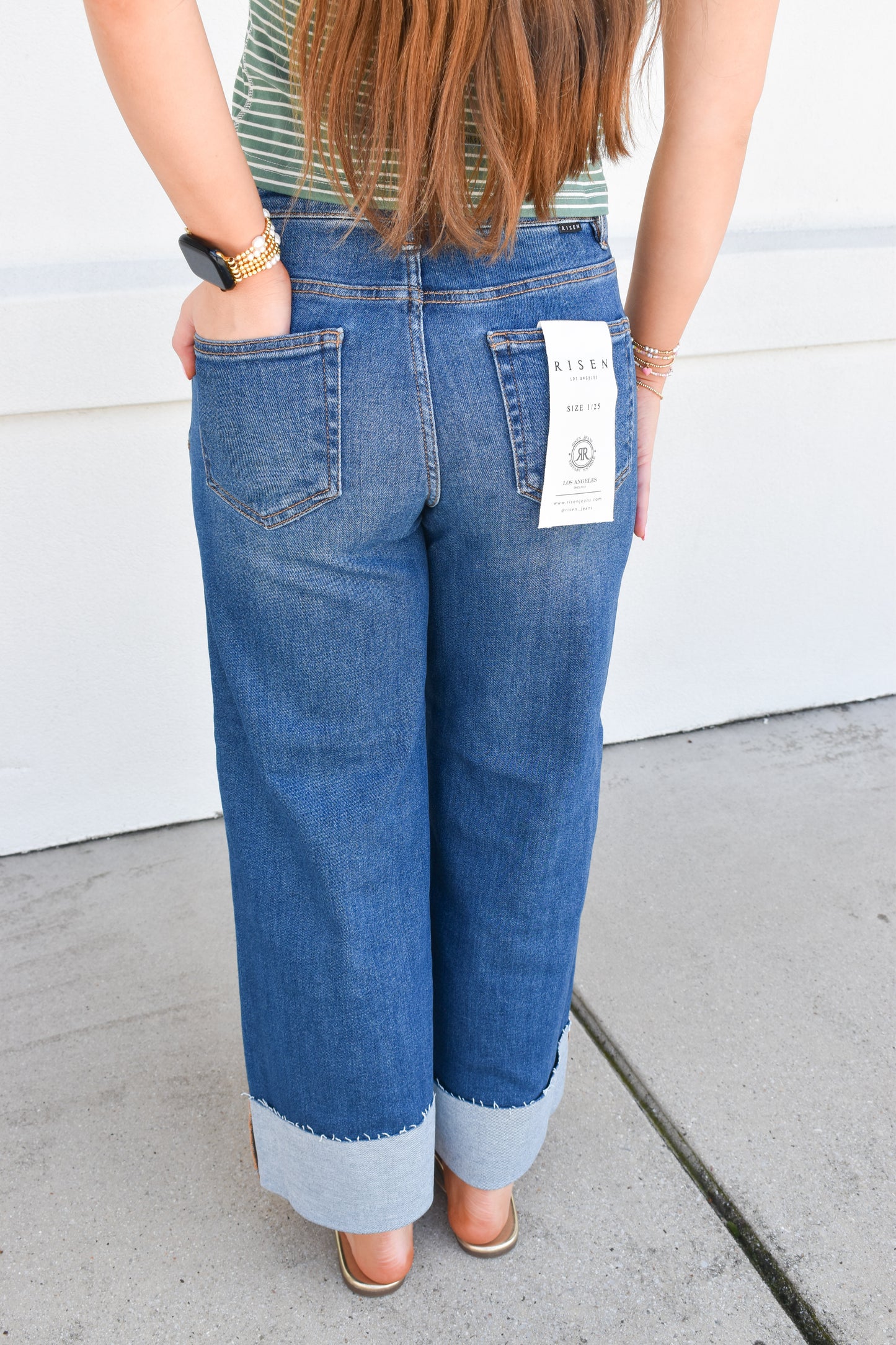Risen High-Rise Wide-Cuffed Jeans: Dark Wash