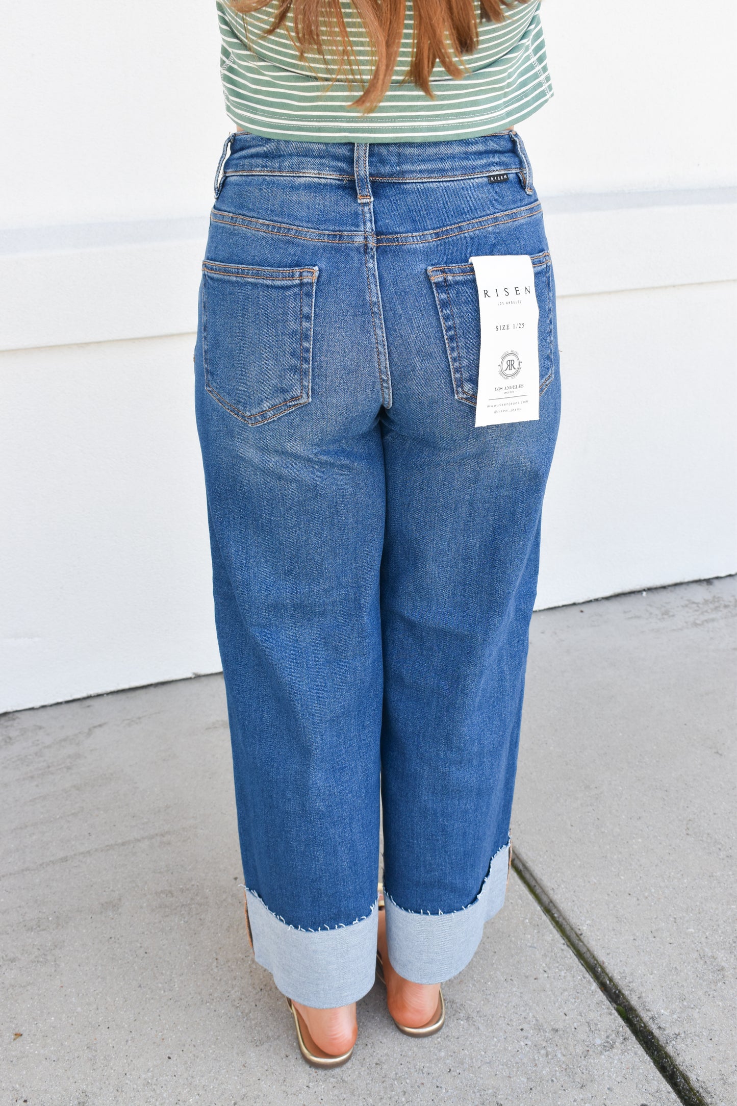 Risen High-Rise Wide-Cuffed Jeans: Dark Wash