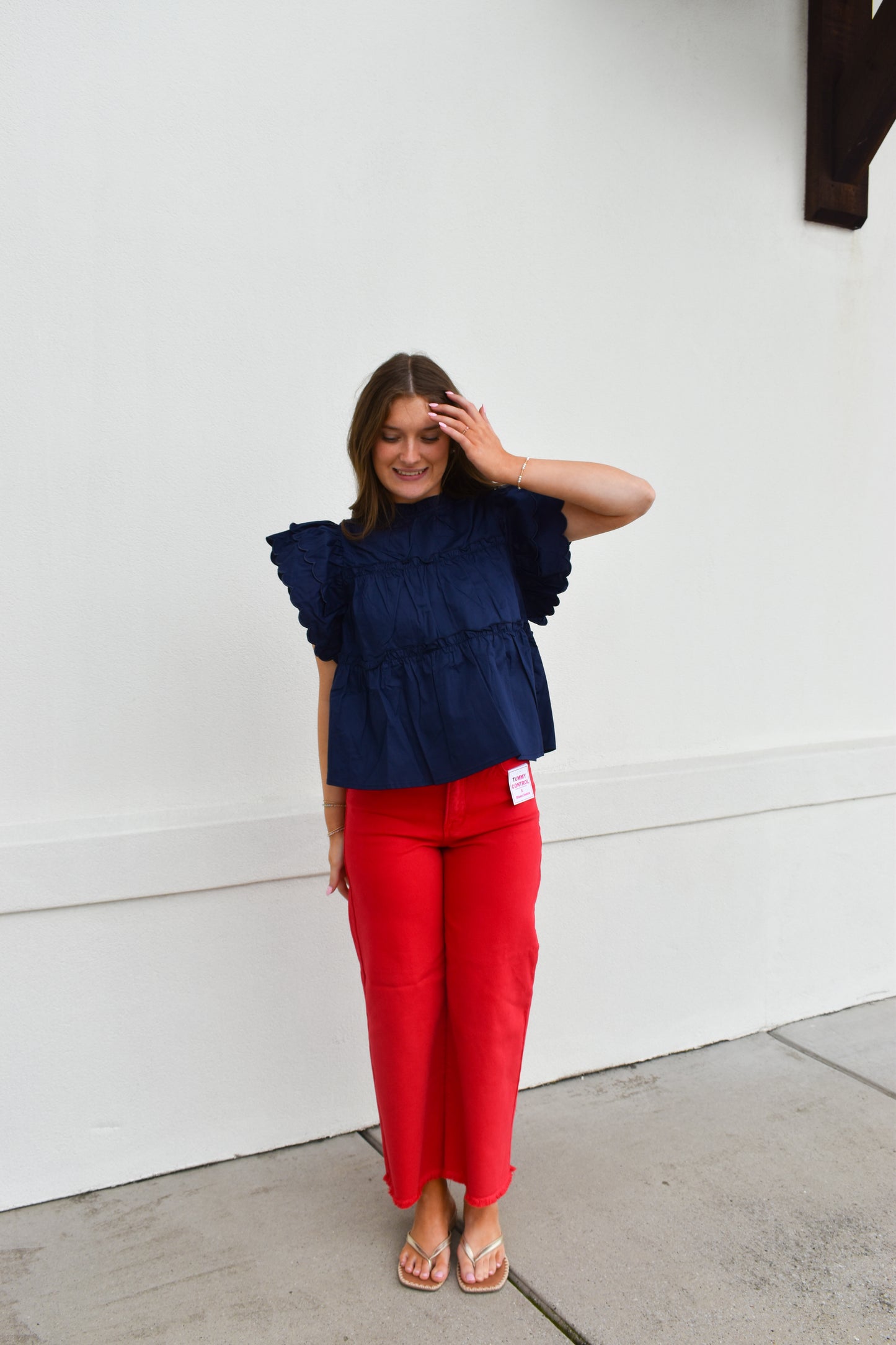 The Navy Scallop Ruffle Top