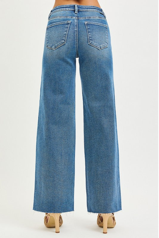 Risen High Rise Wide Leg Jeans: Medium