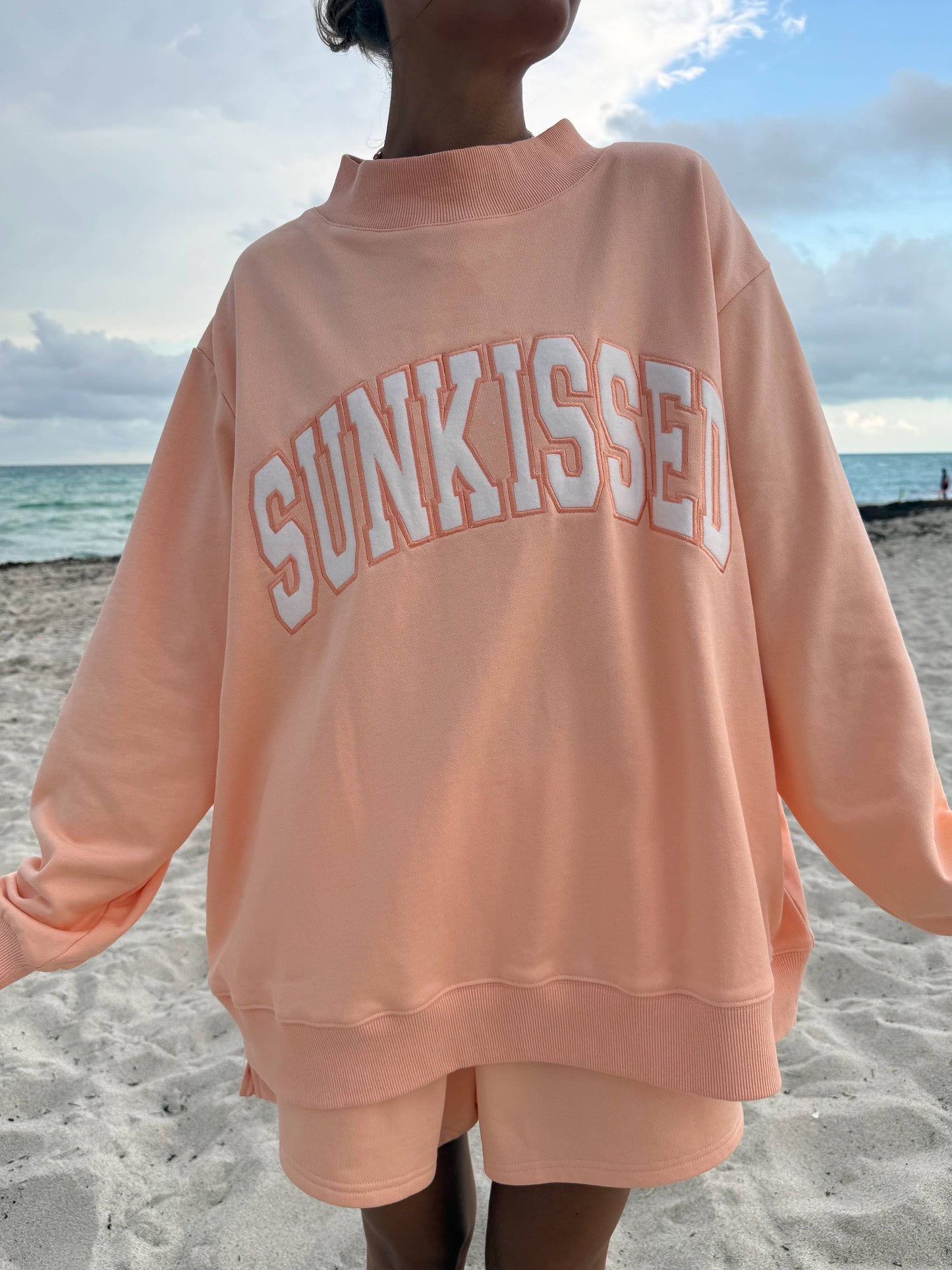 Varsity Sunkissed Embroidered Mockneck: Papaya Orange
